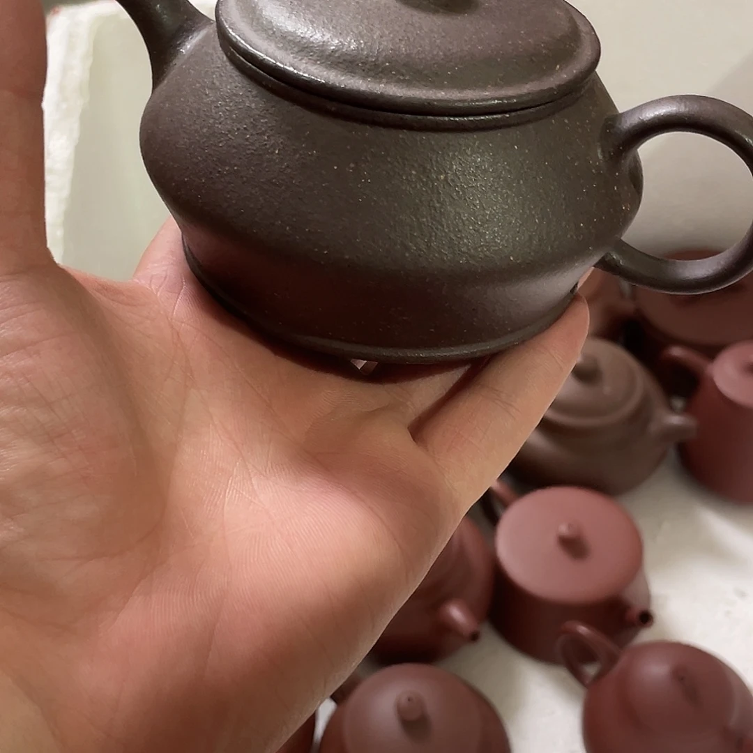 茶杯紫砂曼舒。天青。   徐。