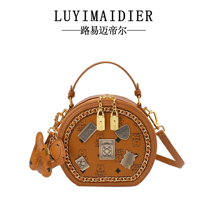 2025新款印花复古百搭时尚潮流手提单肩斜跨圆形女士包包