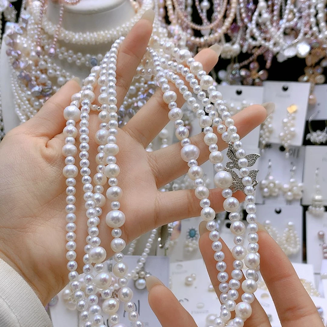 银S925镶嵌耳饰淡水珍珠美***婷