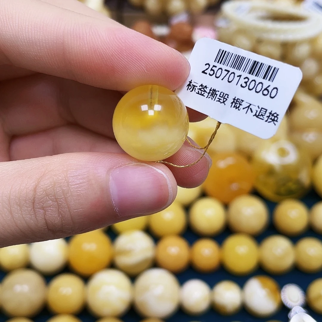 琥珀未镶嵌裸石16.3mm.瑕
