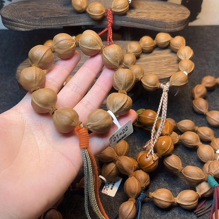 陈***。手串/手链橄榄核21.22梅林铁核
