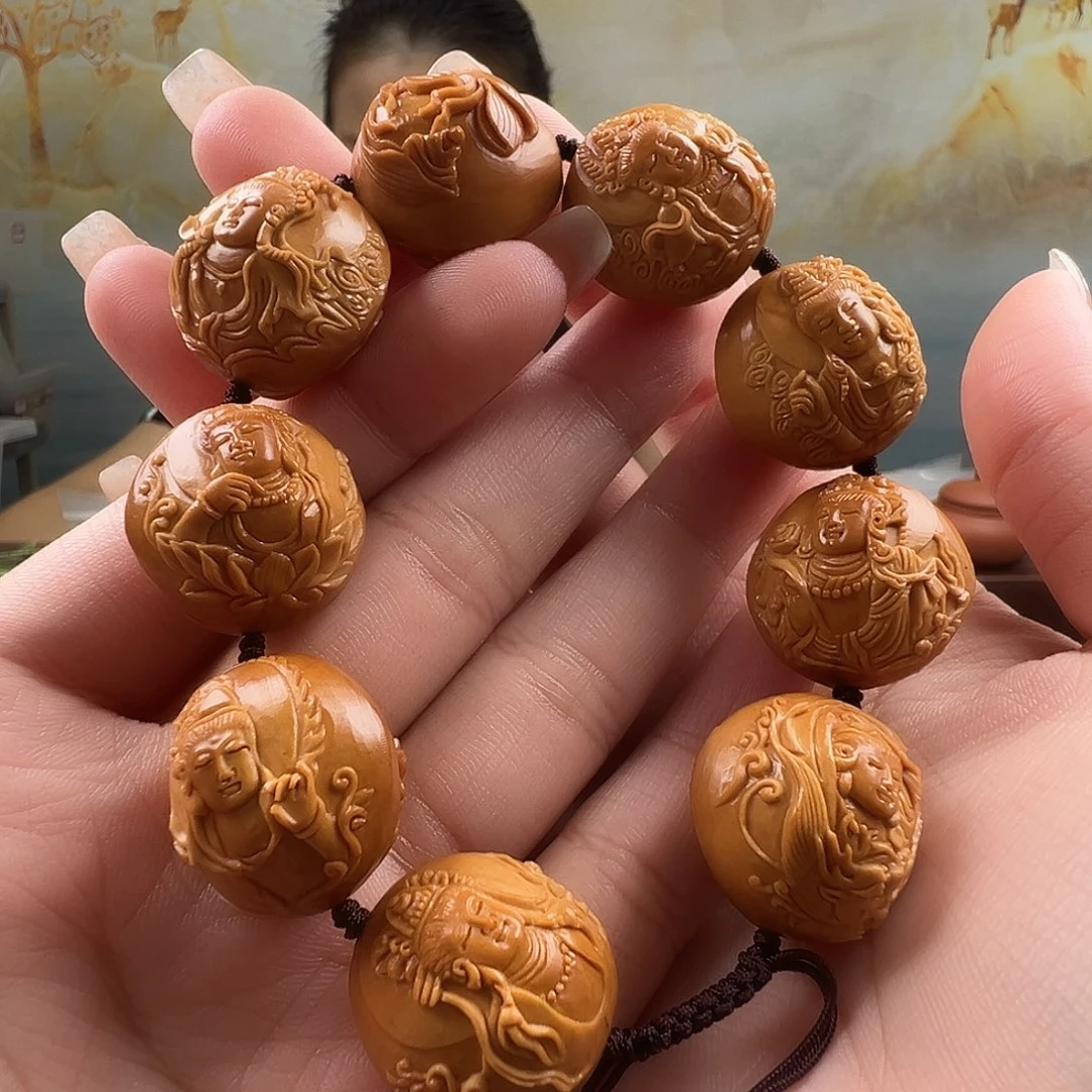 东***动橄榄核吊坠橄榄核