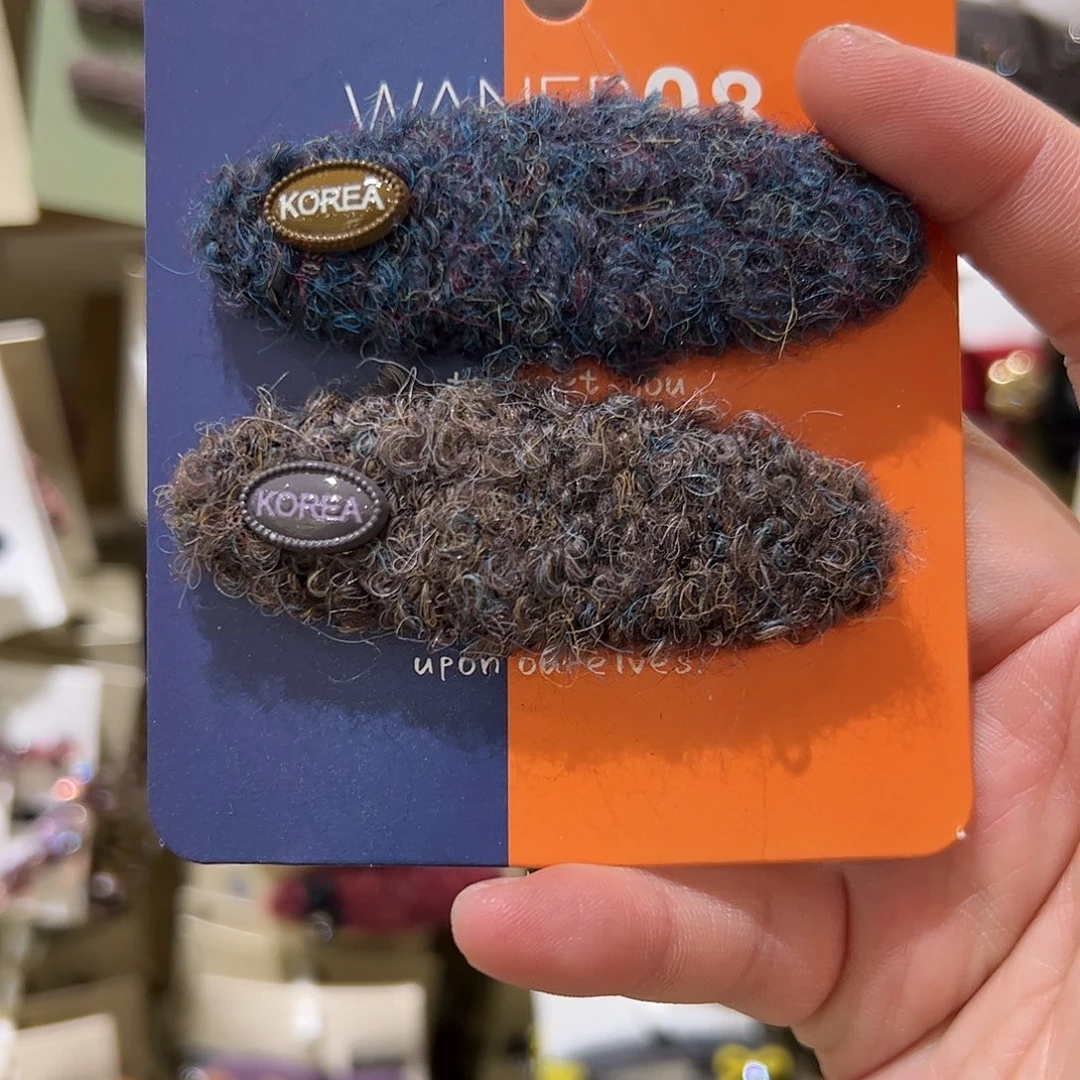 布艺非金属蓝色和咖色毛拜拜夹