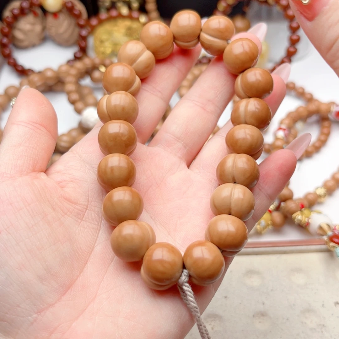 @***猴头核桃吊坠屁桃