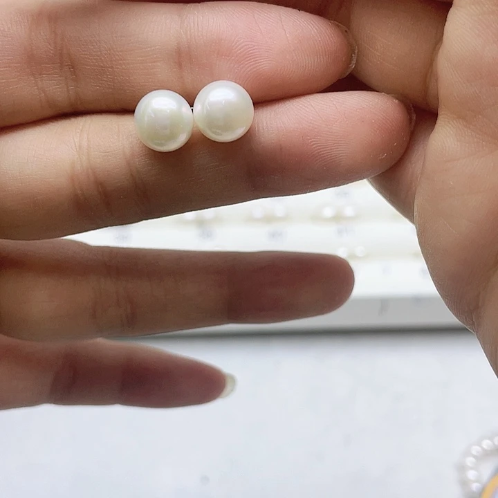 淡水珍珠耳饰银S925镶嵌安****店