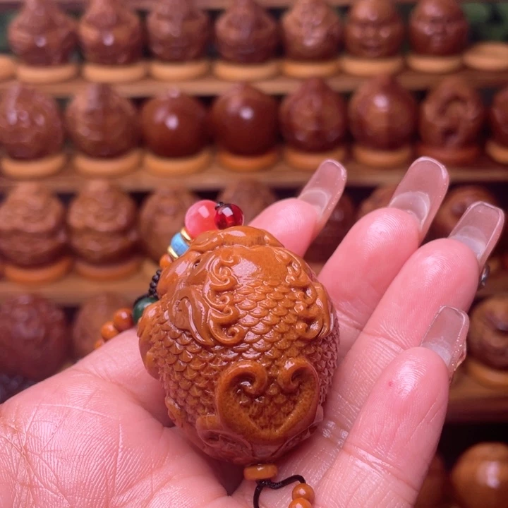 橄榄核把件?****。橄榄雕刻