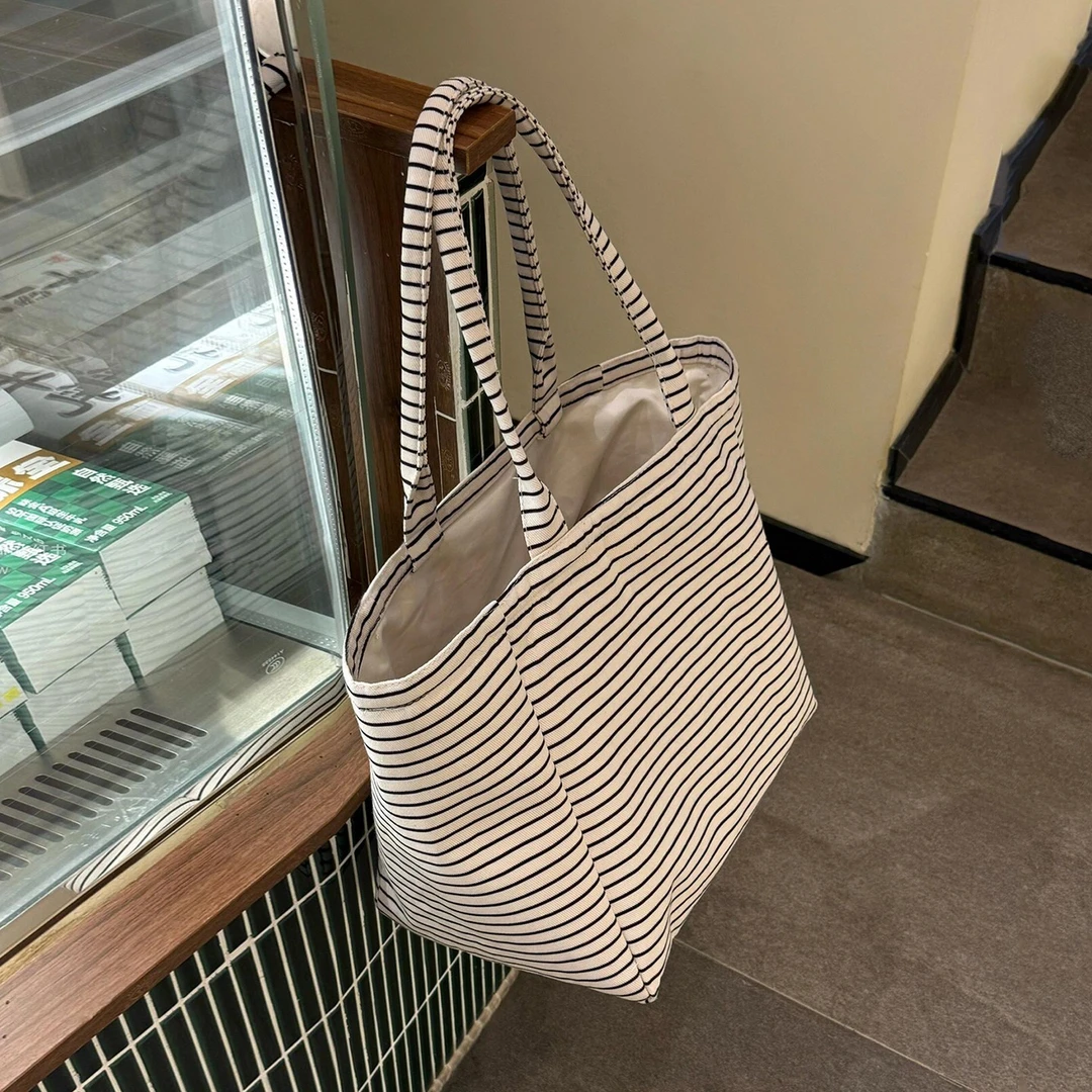 小众条纹帆布包包女2025新款大容量托特包松弛感单肩包手提购物袋