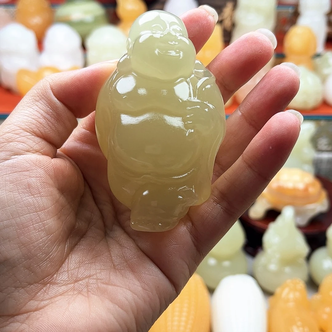 ****º石材大肚佛手把件