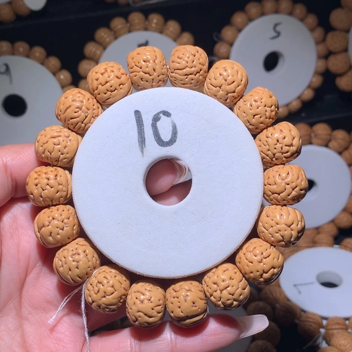 手串桃核野生奶豆