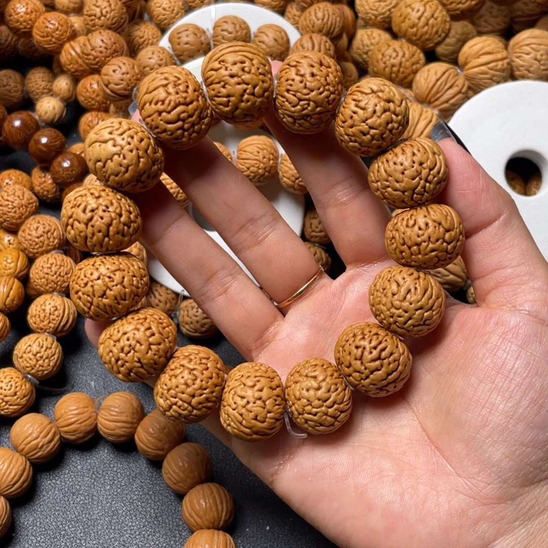 嘿***嘿手串桃核苹果手串