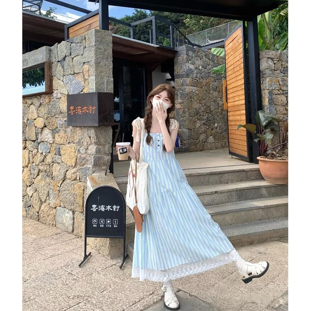 法式蓝色条纹吊带连衣裙女夏季热卖海边度假纯欲长款宽松显瘦胖mm