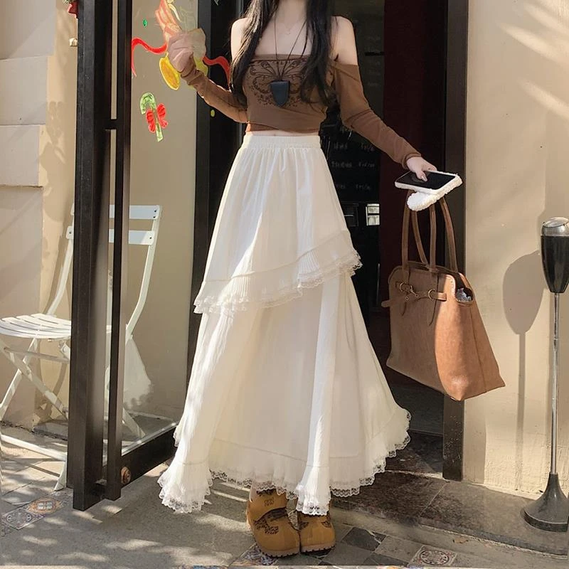 蕾丝拼接白色蛋糕半身裙女2025春掐腰a字miu系不规则蓬蓬华丽长裙