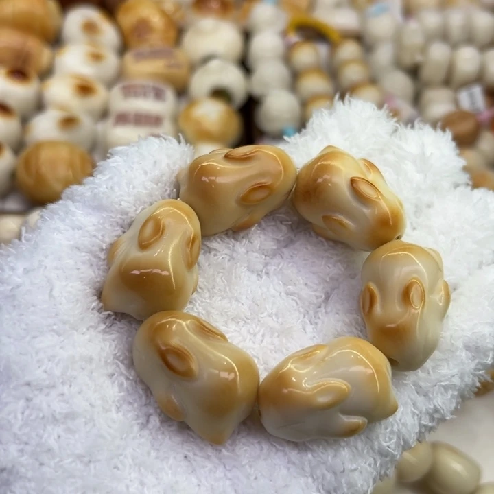 菩提根/象牙果手串86 象牙果原果雕刻炭烧趴趴兔微瑕