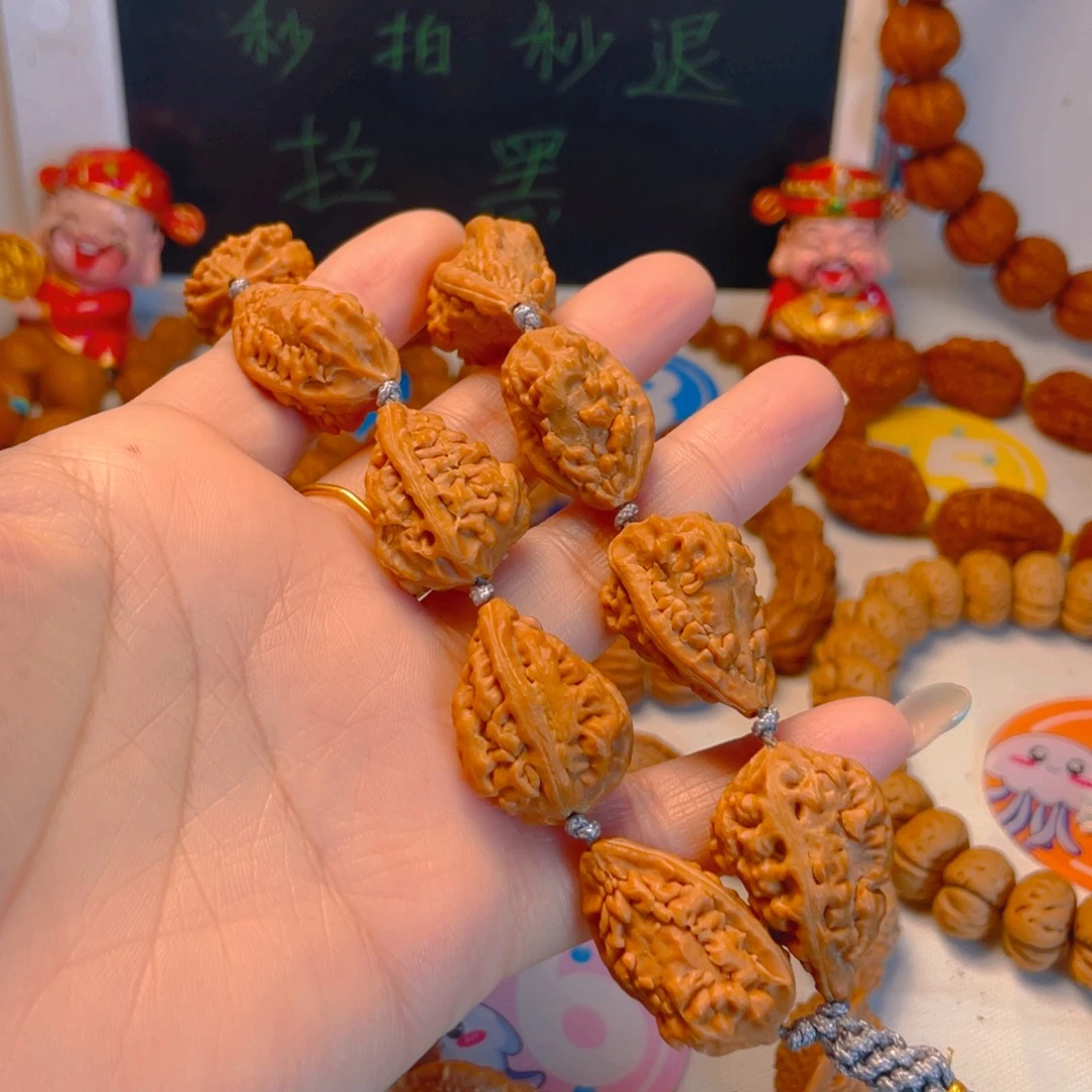 销***头吊坠文玩核桃麒麟角
