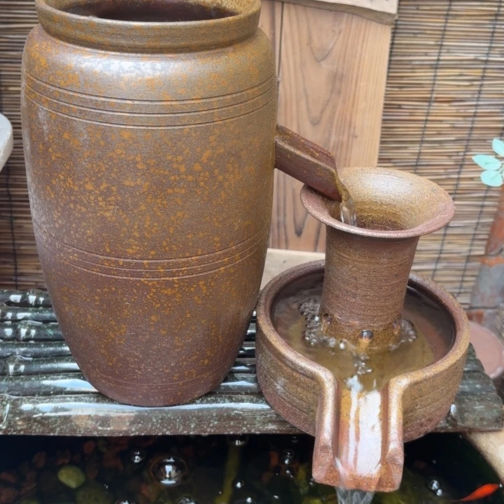 紫砂花盆口径15/32，12/18进水口1.5厘米