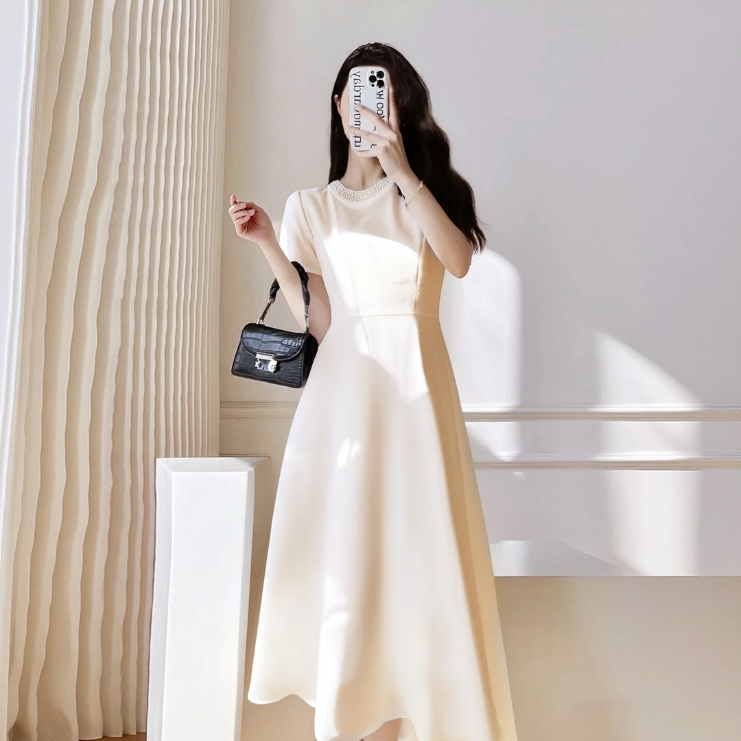 【西西女装】B2025设计师款别致绝美白色圆领小众连衣裙女D1448