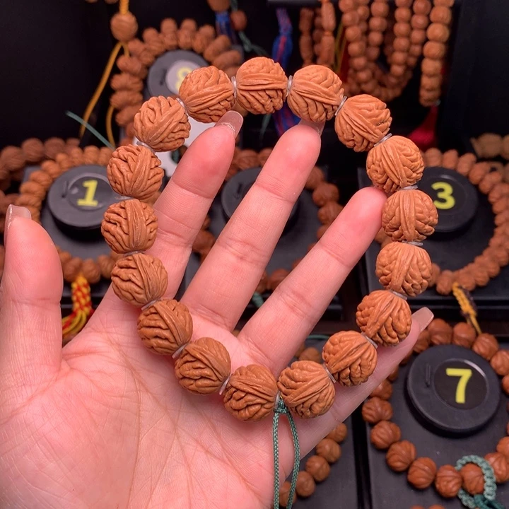 桃核吊坠1.7元宝刺龙手串