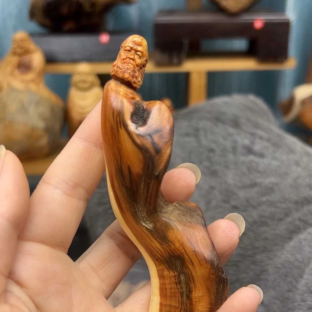 木阿****寻崖柏木摆件手把件