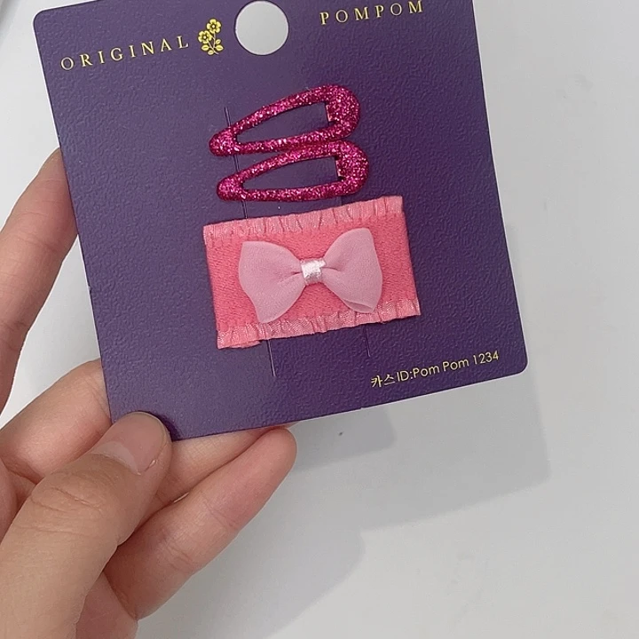 布艺铁合金粉色拜拜夹