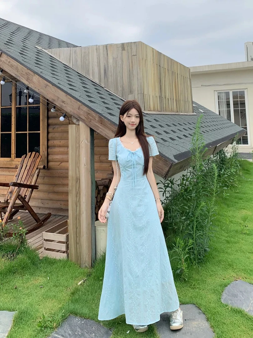 设计感蓝色系带短袖连衣裙女夏季小众蕾丝花边A字裙收腰显瘦长裙