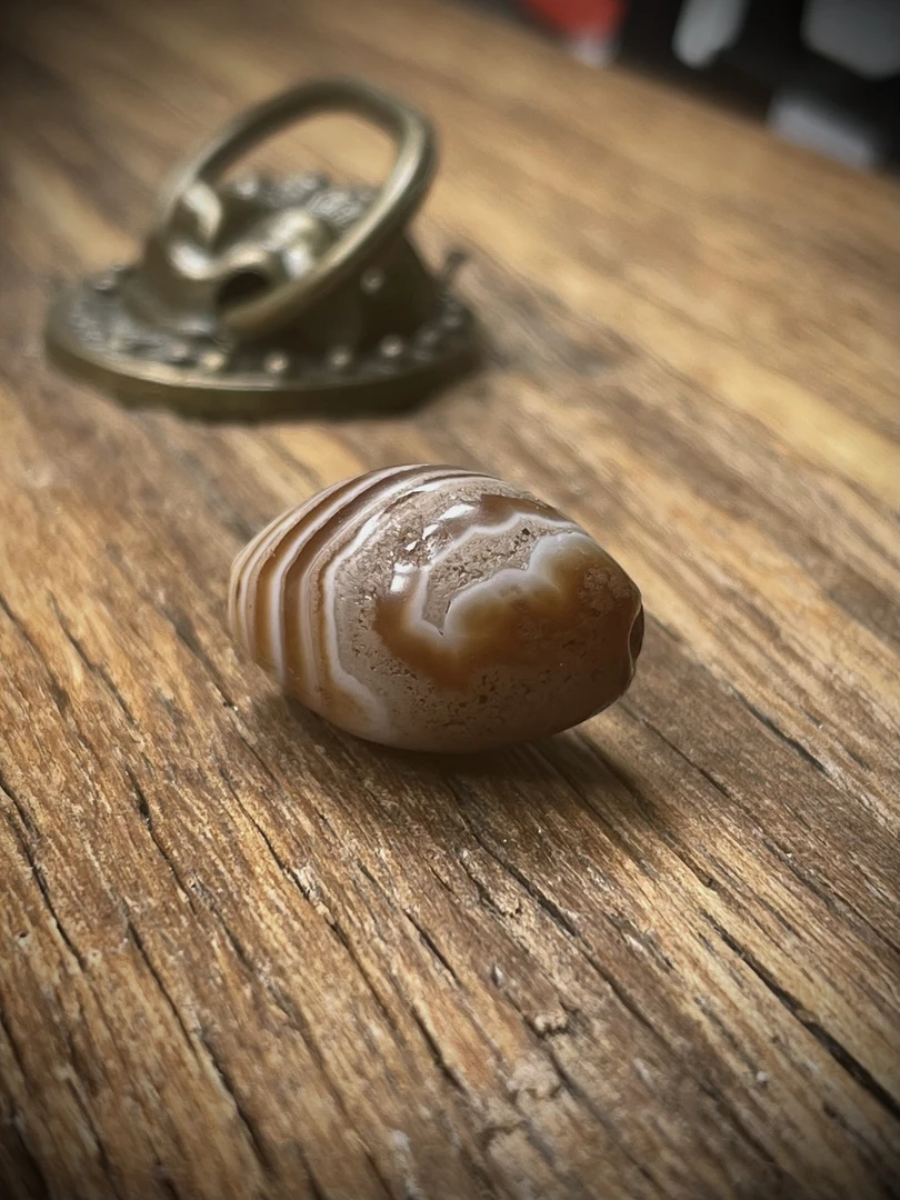 缠丝佛眼橄榄珠子