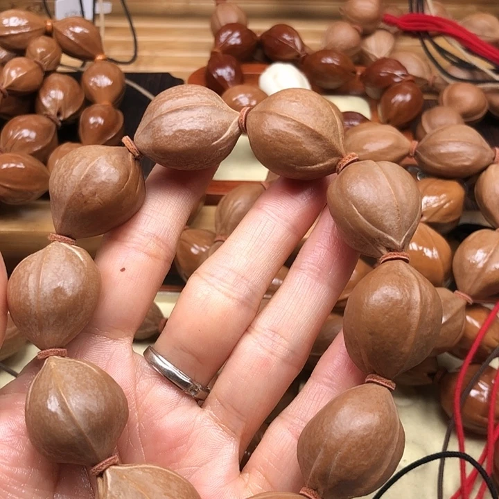耀***光手串橄榄核梅林铁核21 X27