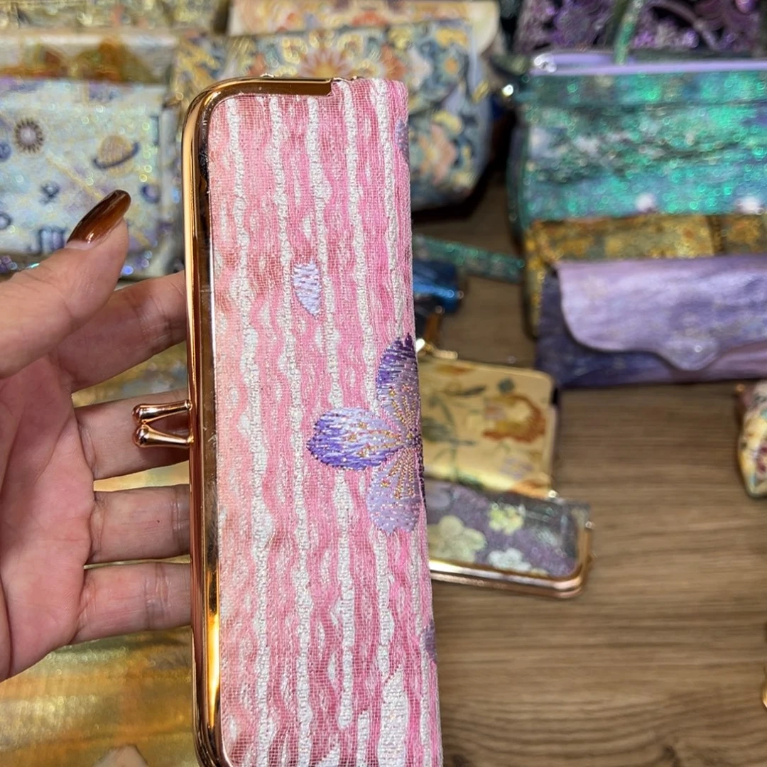 ʜ****蚕丝粉色口金笔袋