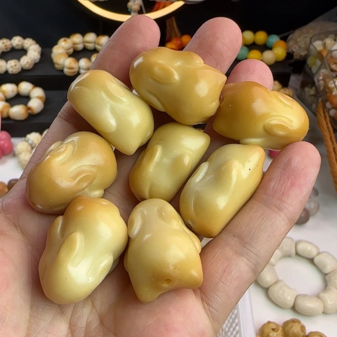 菩提根/象牙果手串瑕疵风化趴趴兔4颗