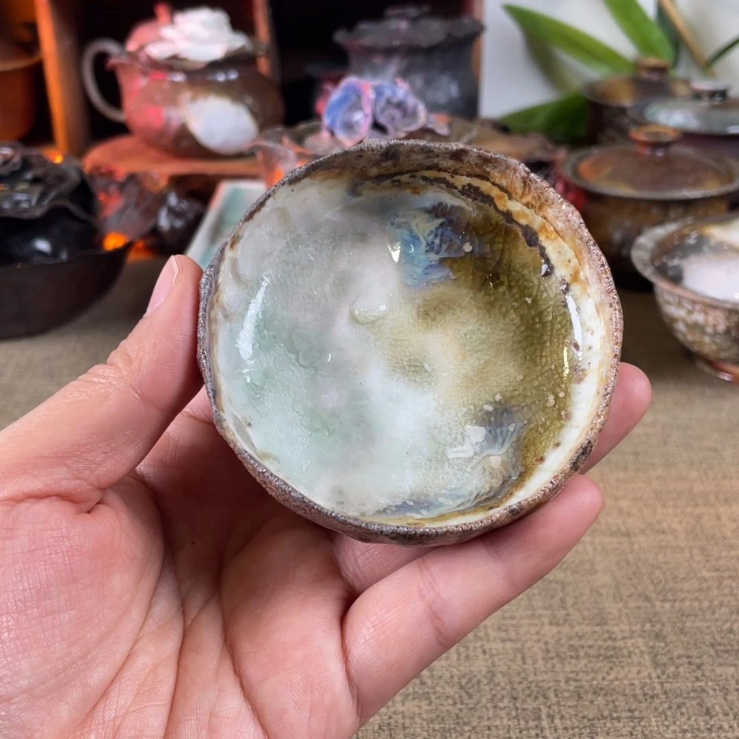 瓷片普洱杯。    柴烧。 容量50