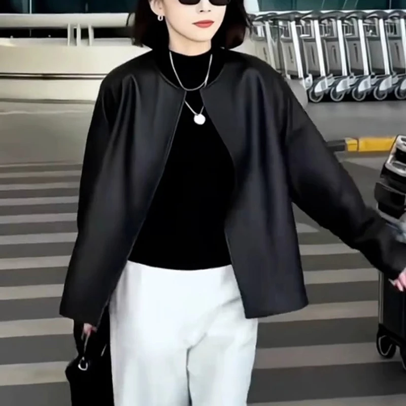 慵懒风黑色上衣+米白色裤子两件套女士2025春季小众气质休闲套装