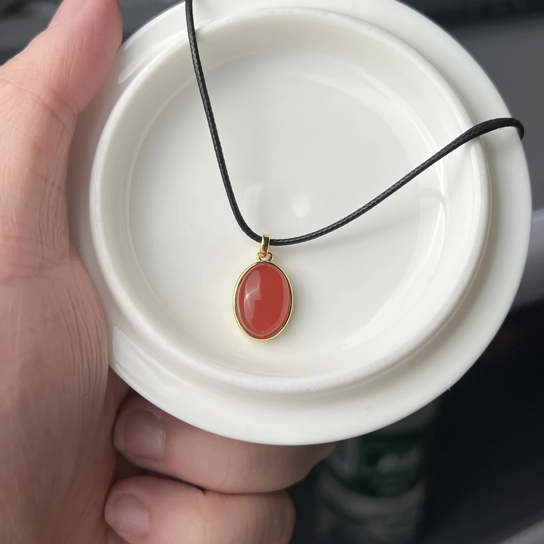 约13.5*9.5mm保山冰红南红S925银镶吊坠