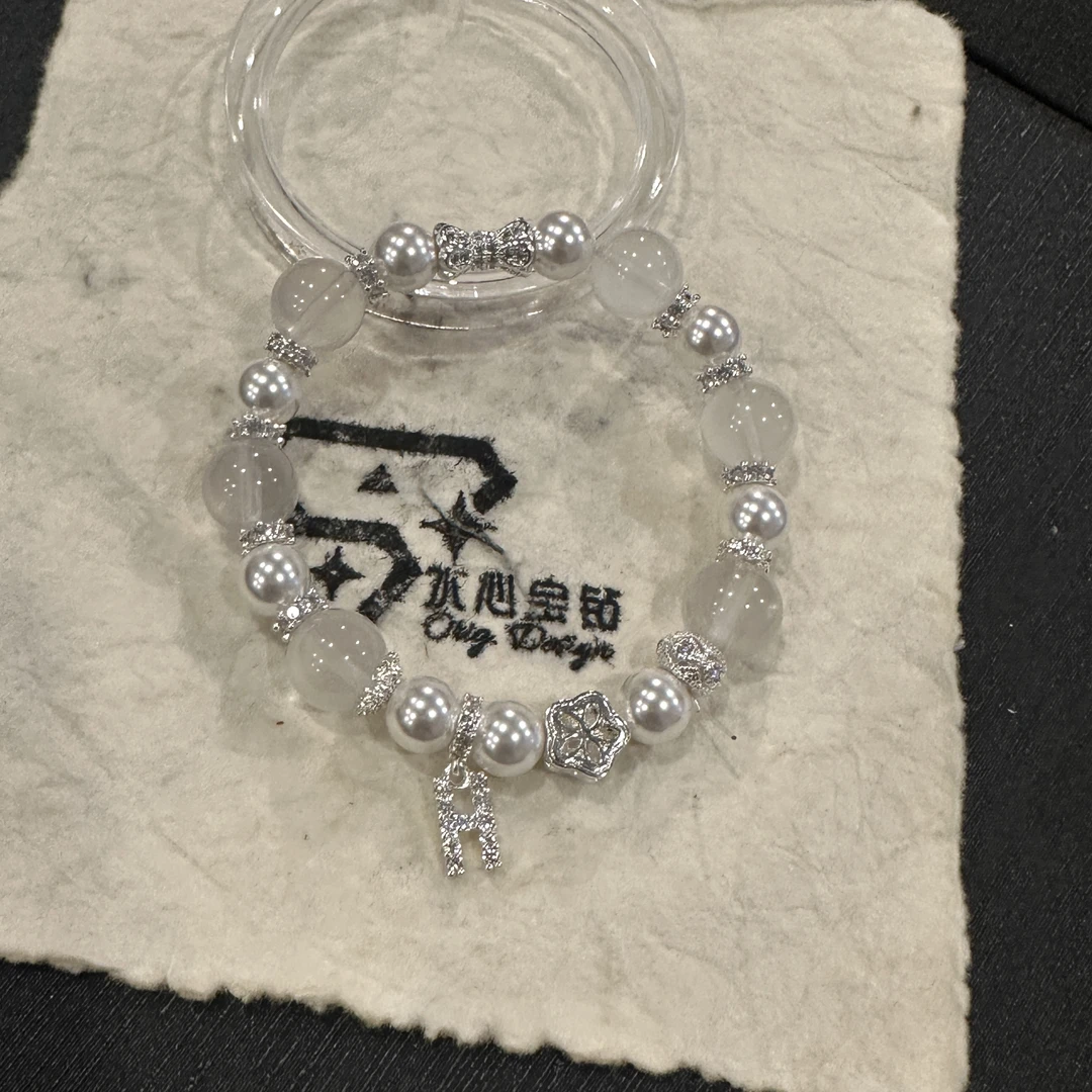 D15 10mm奶白晶➕8mm贝珠设计款手串 颜色微差