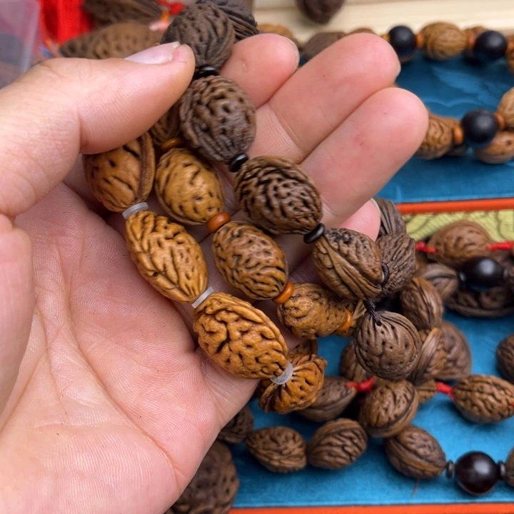 地***坤木质非金属桃枭手串桃枭手串