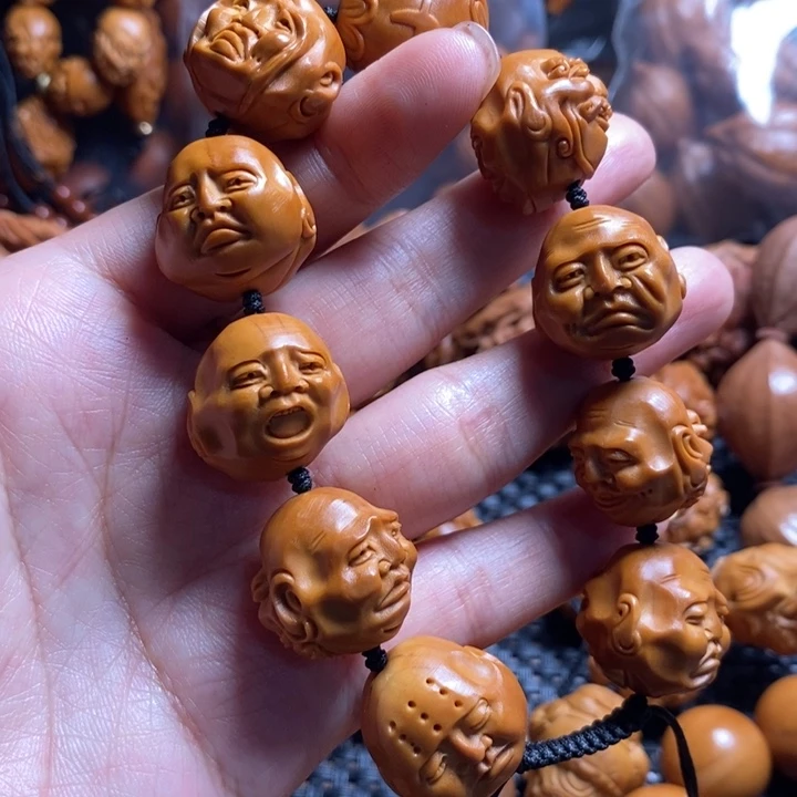 橄榄核吊坠老须派