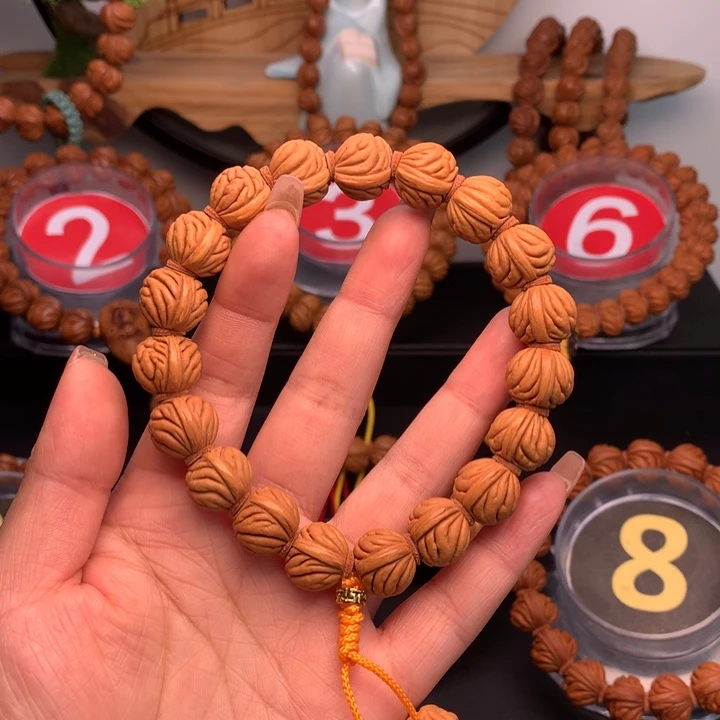 桃核吊坠1.5祥云纹手串