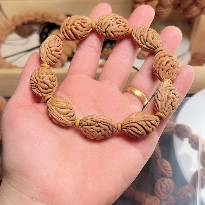 向***笑桃核吊坠正宗桃核手串