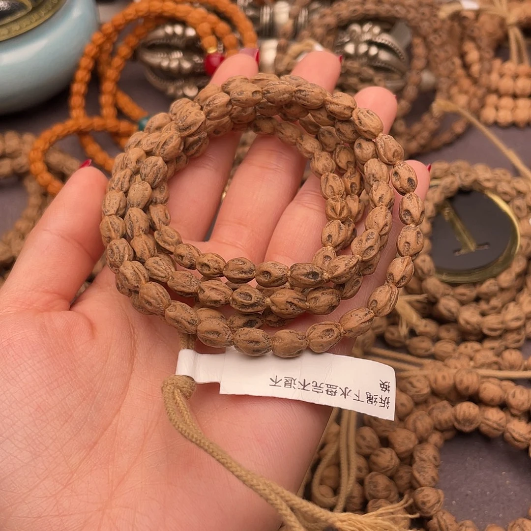 龙***象柏香籽/百香籽把件