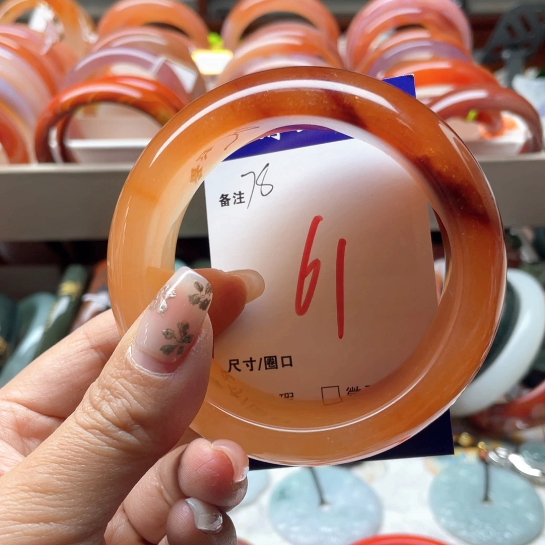 小***橘石英岩玉未镶嵌手镯