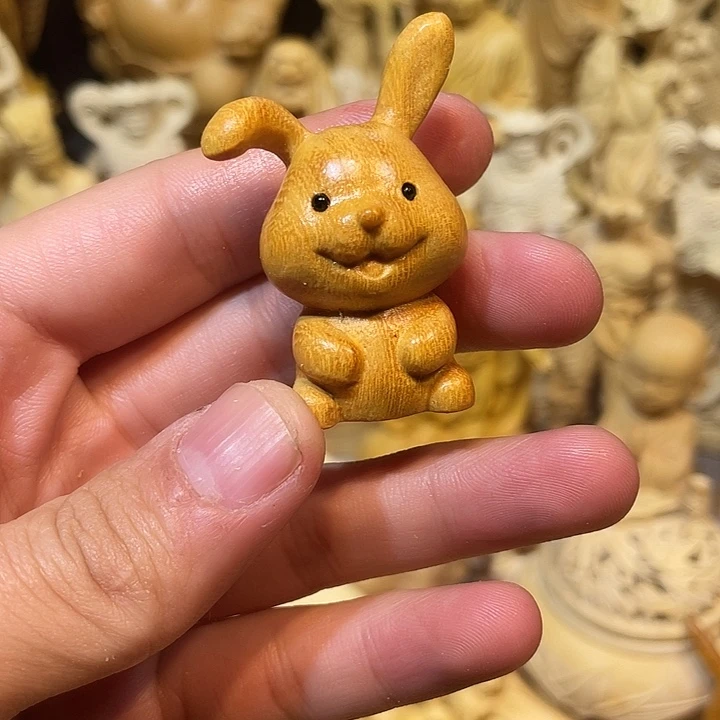 黄杨木兔子手把件