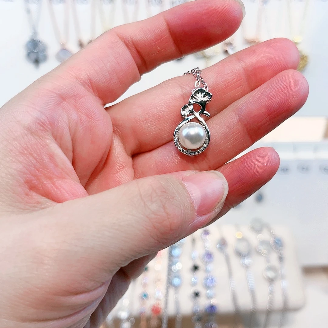 痴****足银镶嵌淡水珍珠吊坠(赠链)