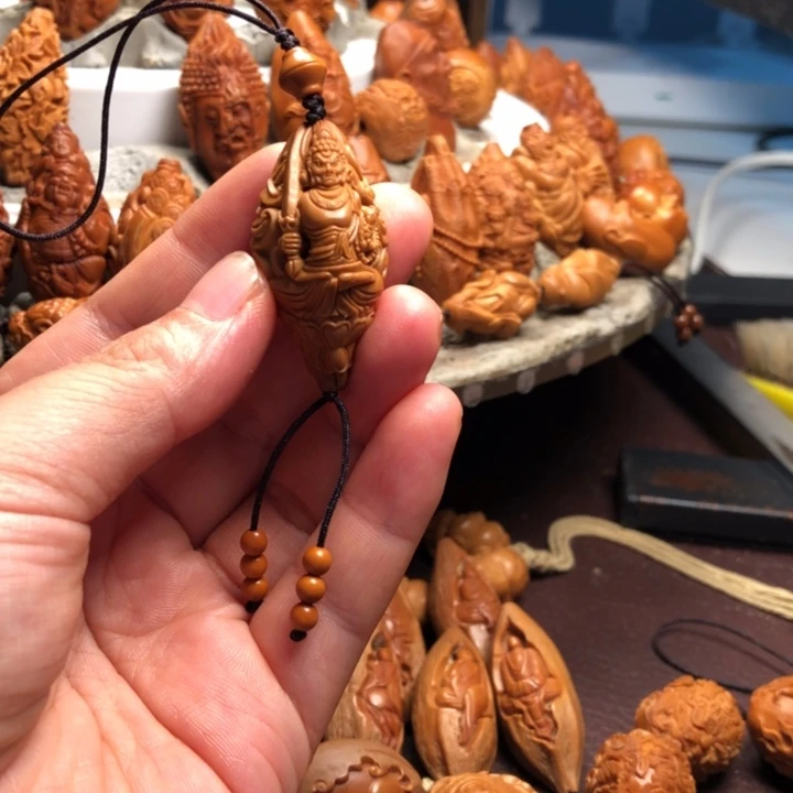丁***帅吊坠橄榄核橄榄核雕刻手把件