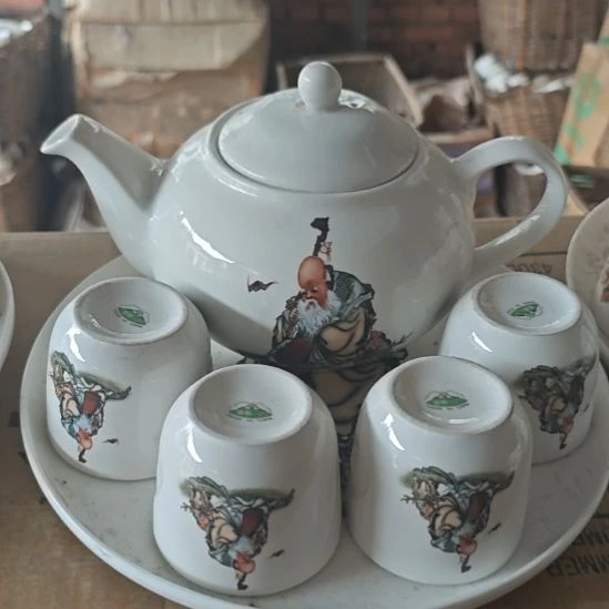 库存微瑕老寿星多孔茶壶一套