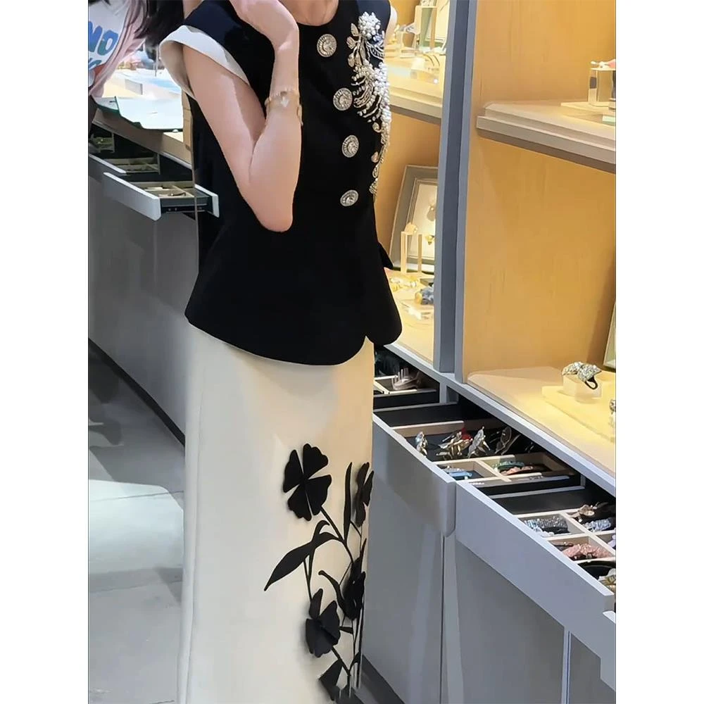 2025年夏季今年流行流行漂亮高级感清冷感气质上衣半裙两件套装女