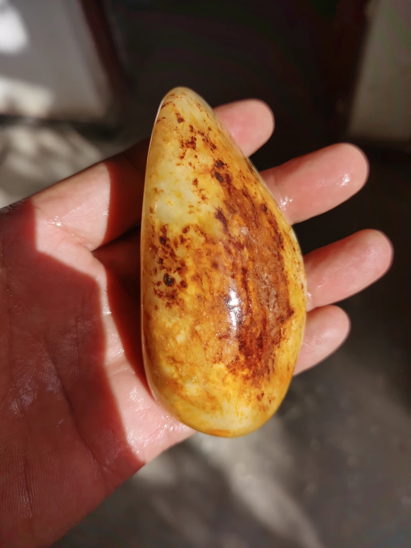 和田玉红皮手把件