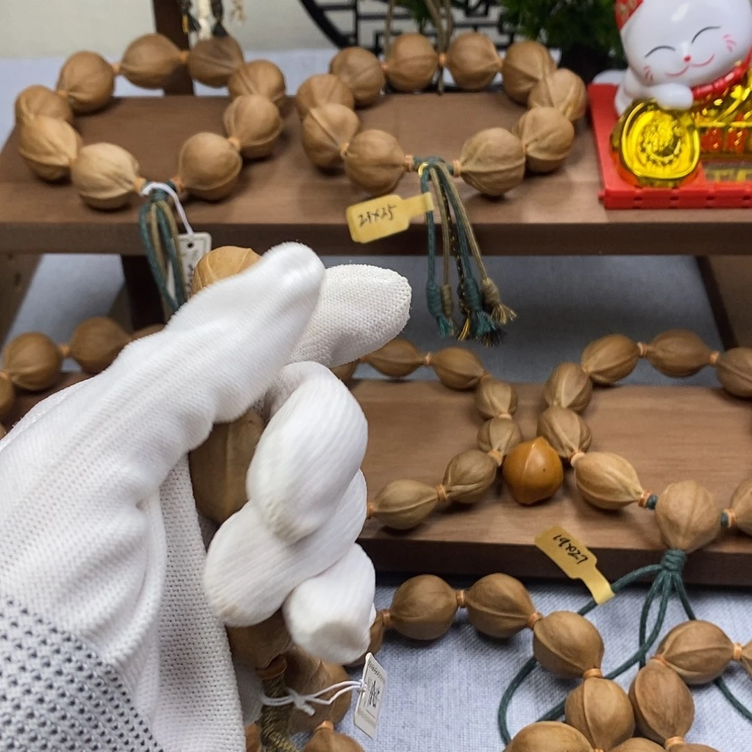 萧***月手串橄榄核梅林铁核1825