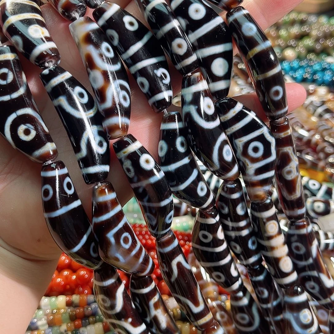 玛瑙/玉髓未镶嵌珠宝半成品老玛瑙牛角天珠一条18x38mm8颗