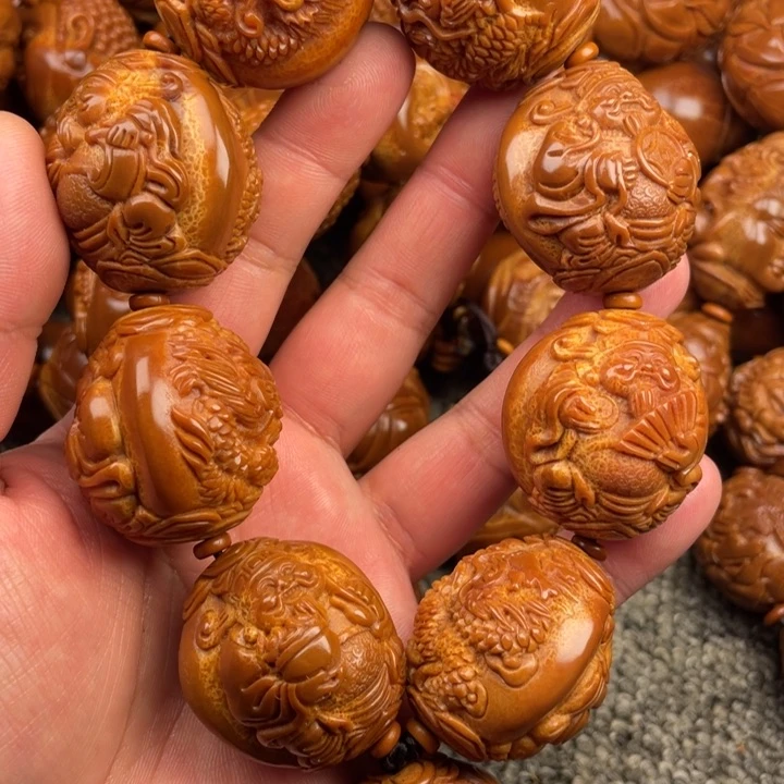 橄榄核吊坠爱****8橄榄核手持