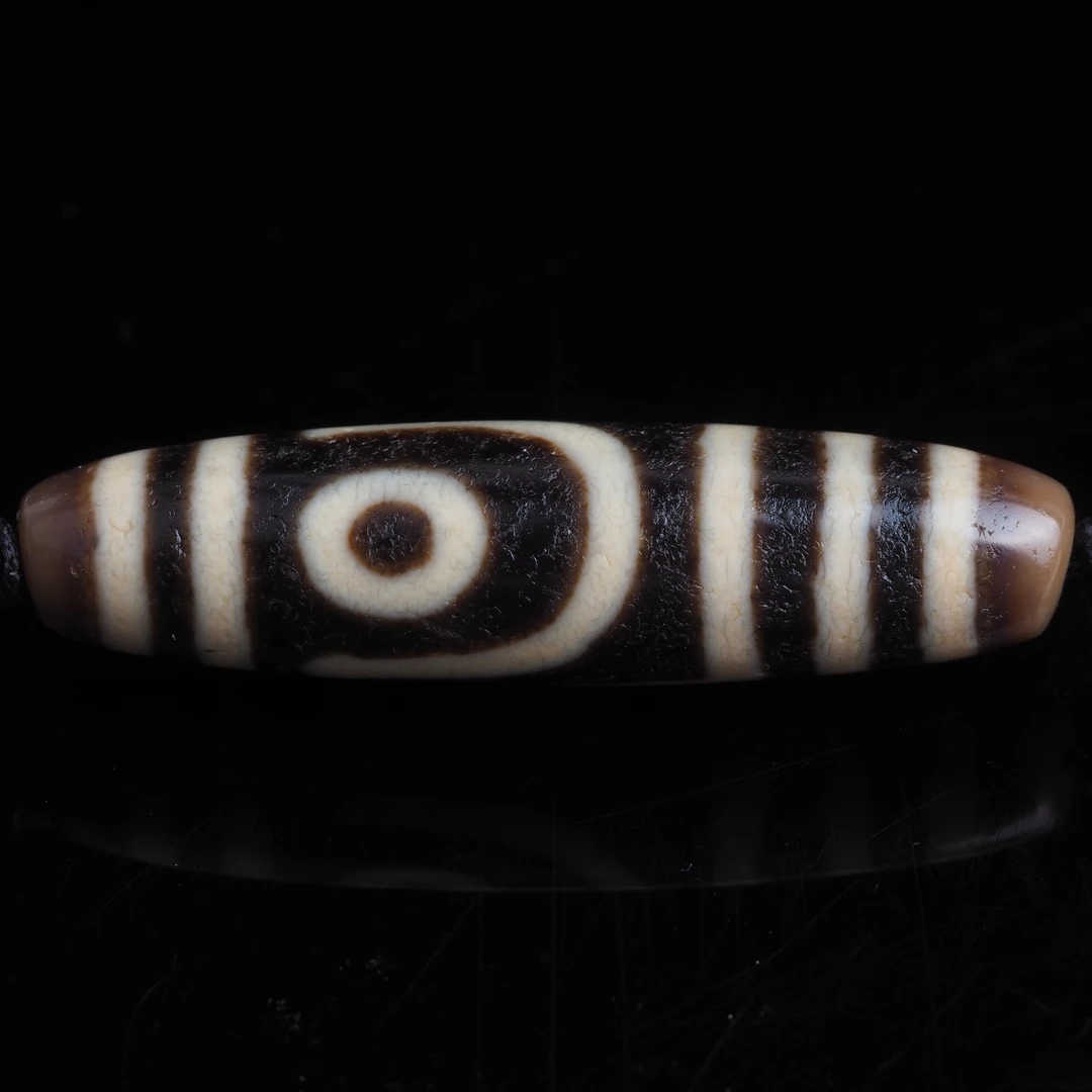 【一代老台湾上肯天珠·新超】百里挑一！超顶如意二眼47mm条纹玛瑙