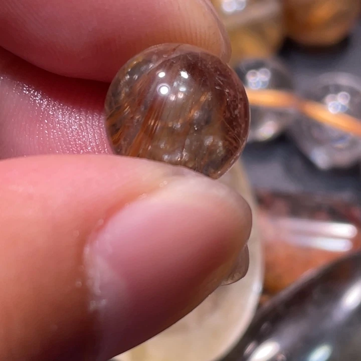 戎***生未镶嵌颈饰发晶钛晶球