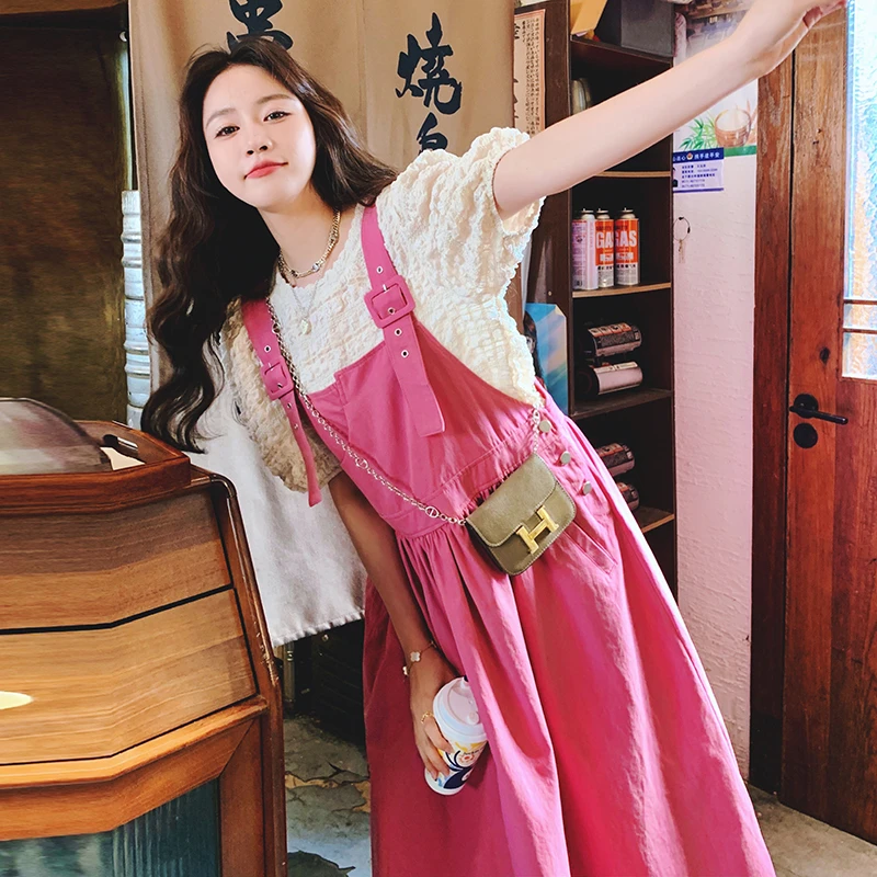 今年流行爆款学院风减龄韩系穿搭玫红背带连衣裙2025新款独特超火